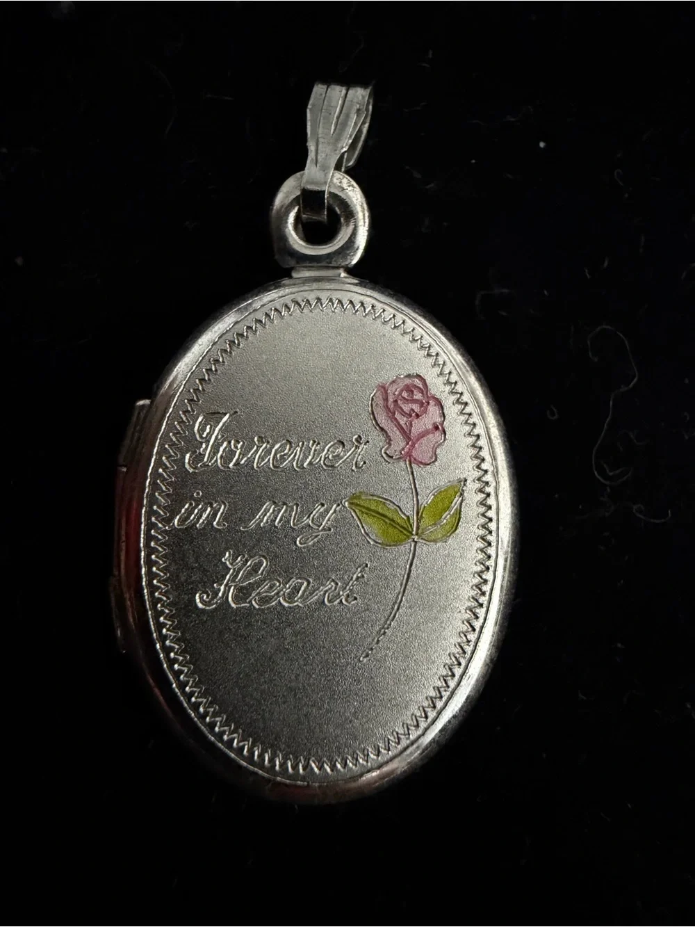 925 Sterling silver locket. “Forever in my heart.”